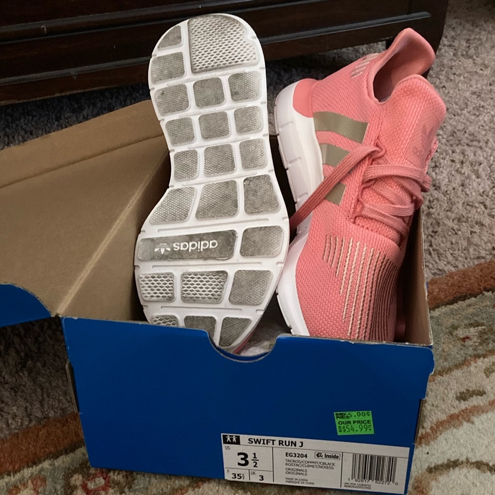 Brand new Adidas tennis shoes.  Warn only once (on the way home from the store).